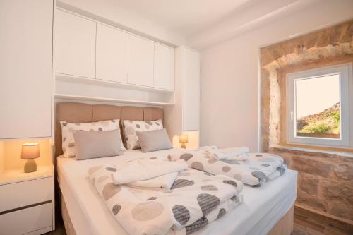 Posteľ alebo postele v izbe v ubytovaní Old Stone House GP