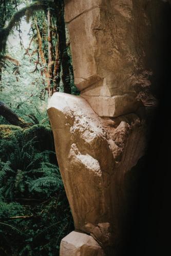 a large rock in the middle of a forest at Emotional Grand Motel in Fontaneto dʼAgogna