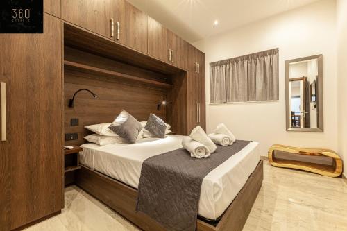A bed or beds in a room at Brand new spacious apartment in sunny St Julians by 360 Estates