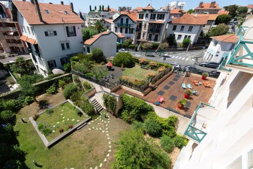 an aerial view of a garden in a city at Résidence Pierre & Vacances Premium Haguna in Biarritz