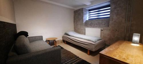 A bed or beds in a room at Accommodation for working team or big family