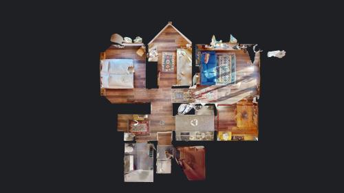 a collage of photos of a house on a wall at Truoch in Samedan