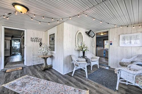 a living room with a couch and chairs and a table at Spacious Family-Friendly Home in Massillon! in Massillon