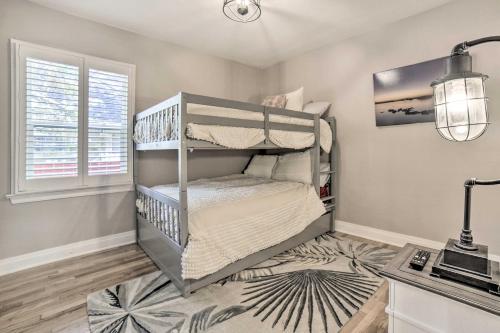 a bedroom with two bunk beds in a room at Enchanting Reno Retreat with Deck Walk to Midtown! in Reno
