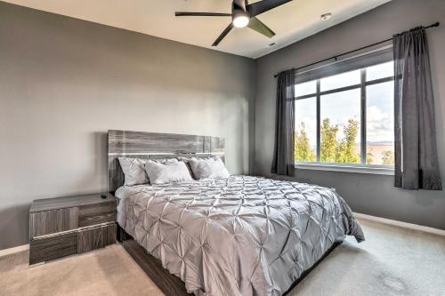 a bedroom with a large bed and a window at Quaint Issaquah Home - Walk to Shops and Dining in Issaquah