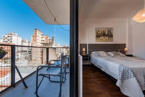 Postel nebo postele na pokoji v ubytování Entre Ríos 73 - B Centro