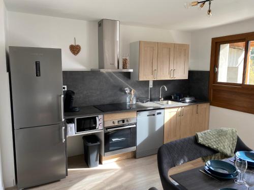 Η κουζίνα ή μικρή κουζίνα στο Appartement Le Lauzet