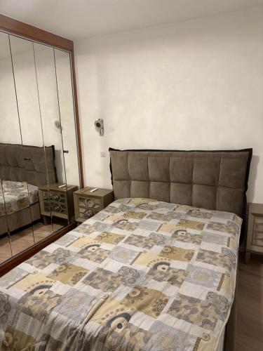 Un pat sau paturi într-o cameră la San Marco flat