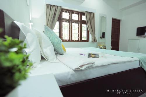 Cama o camas de una habitación en Himalayan Villa