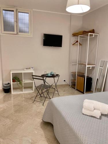 Μια τηλεόραση ή/και κέντρο ψυχαγωγίας στο Ginevra Rooms