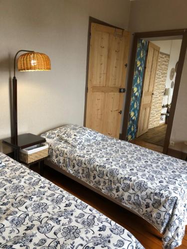 Ein Bett oder Betten in einem Zimmer der Unterkunft Eply dort