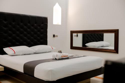 Cama o camas de una habitación en Hotel Panorama Medellín