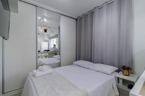 Cama o camas en una habitación en un estudio nuevo y equipado cerca del parque de Ibirapuera y del metro del Hospital de São Paulo - ID 02