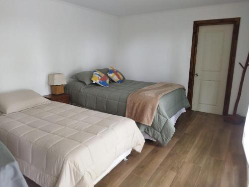 Postel nebo postele na pokoji v ubytování Container Home