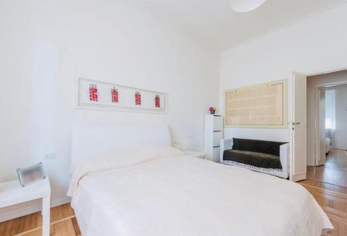 Cama o camas de una habitación en Milano Fiera Rho San Siro Apartment