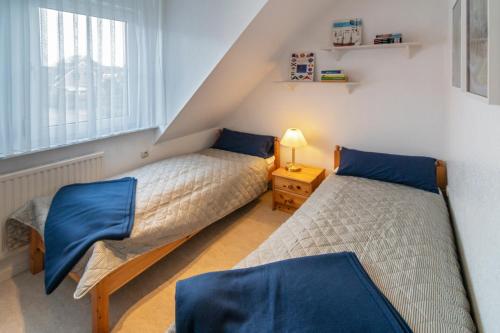 Postel nebo postele na pokoji v ubytování Labskaus