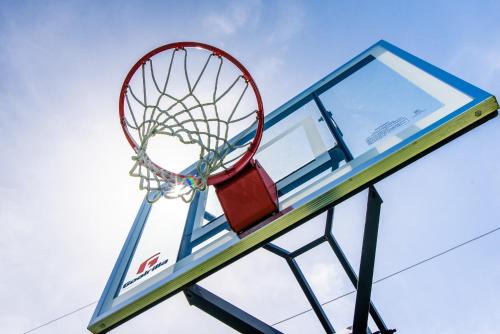 a basketball hoop with a net on a clipboard at Beach Living at Discovery Point Club in West Bay
