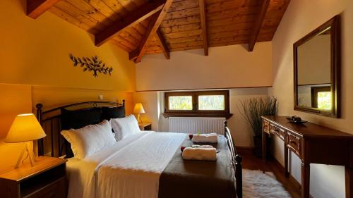 Кровать или кровати в номере Petrini Villa