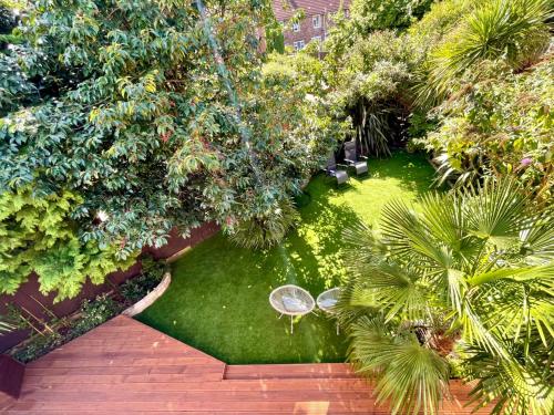 an aerial view of a garden with plants and trees at Luxury Oriental Home with Exotic Garden & Free Parking in West Derby