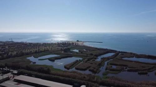 an aerial view of a city and a body of water at Elegance B&B in Ladispoli