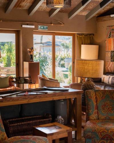 a living room with a table and a couch at Hotel Boutique BC Wine Casablanca in Casablanca