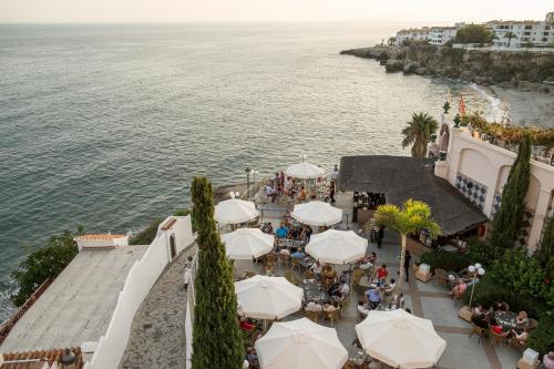 an aerial view of a restaurant next to the water at Toboso Apar - Turis in Nerja