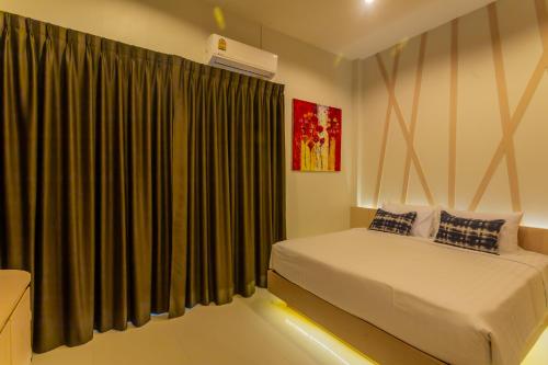Katil atau katil-katil dalam bilik di 3 Bedroom Platinum Pool Villa Smooth as Silk