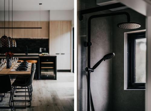 a kitchen and a dining room with a table and a lamp at The Deck - Hepburn Springs Daylesford in Hepburn