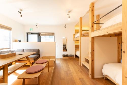 a small apartment with a loft bed and a desk at 強羅base B棟 - GORA base B in Gora
