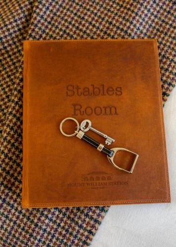 a book with a pair of scissors on top at Mount William Station in Willaura