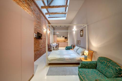 Postel nebo postele na pokoji v ubytování Apor Apartments