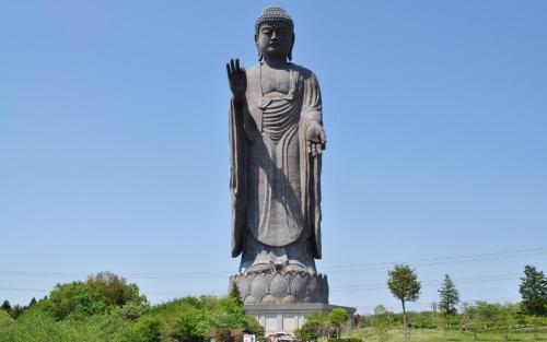 a large statue of a king in a park at BEB5 Tsuchiura by Hoshino Resorts in Tsuchiura