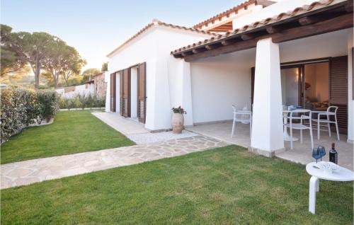 Amazing home in Baia SantAnna Budoni with 3 Bedrooms and WiFi