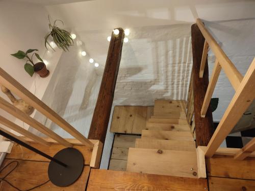 an overhead view of a wooden staircase in a room at Balkan Retreat in Bešenovo
