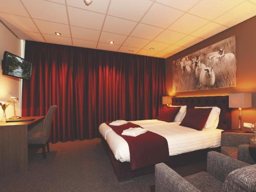 מיטה או מיטות בחדר ב-Hotel Kuik