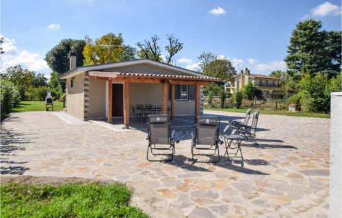 a patio with chairs and a gazebo at Patrizio Country House in Labico