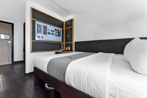מיטה או מיטות בחדר ב-The Z Hotel Covent Garden