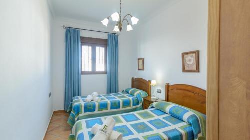 Postel nebo postele na pokoji v ubytování Villa Brenda Conil de la Frontera by Ruralidays