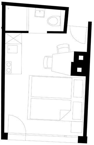 a floor plan of a house with furniture at Casa Las Caglias in Flims