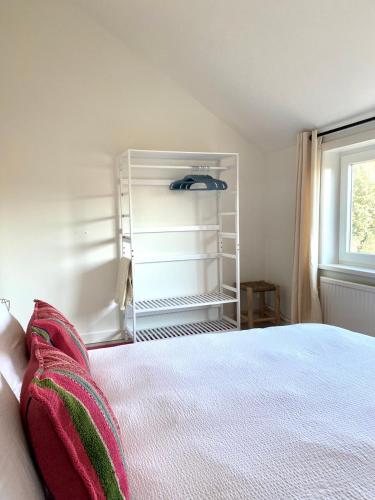 Postel nebo postele na pokoji v ubytování Zeehuis Zuidzande