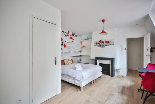 Posteľ alebo postele v izbe v ubytovaní 42#Studio 2Pers#Sèvres-Lecourbe#Necker