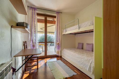 Posteľ alebo postele v izbe v ubytovaní La casa di Sarah