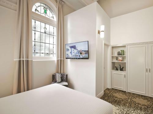 Postel nebo postele na pokoji v ubytování Rendezvous Hotel Melbourne