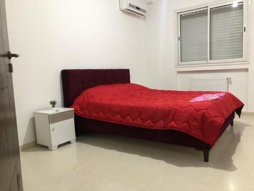 מיטה או מיטות בחדר ב-Maison Karam