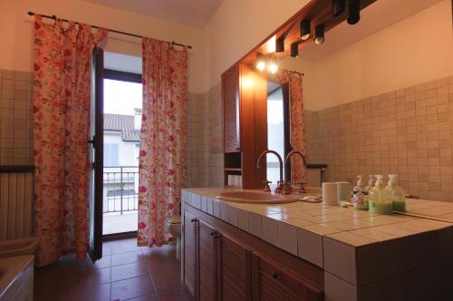 Kuchyň nebo kuchyňský kout v ubytování B&B il Baciass