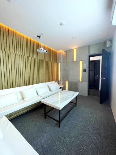 Posezení v ubytování SOUTHPICKRESORT & HOTEL INC.