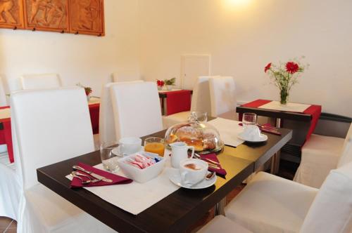 Reštaurácia alebo iné gastronomické zariadenie v ubytovaní Hotel Dei Templi