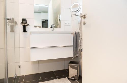 Koupelna v ubytování SERVENTO Boardinghouse