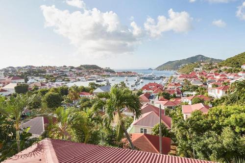 a view of a city with houses and a harbor at Viewstar in Gustavia