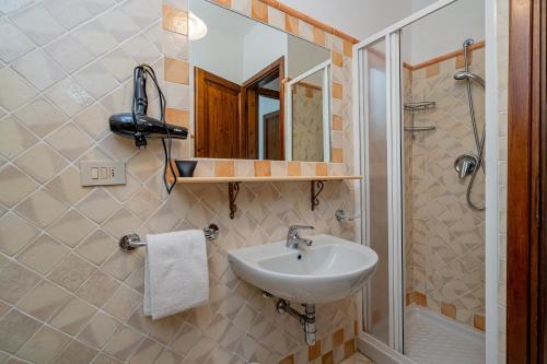 Koupelna v ubytování Porto San Paolo Apartments